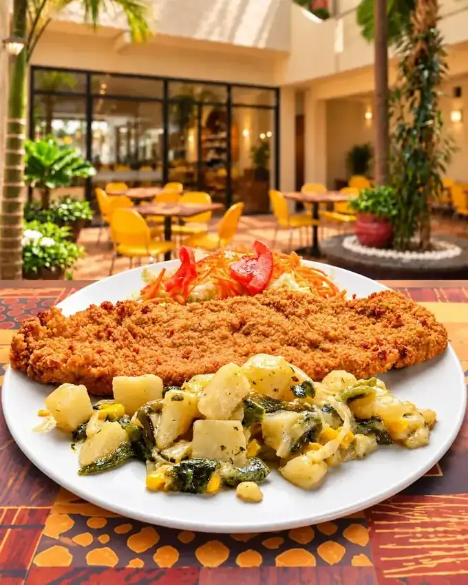 Milanesa de pollo empanizada de La Parrilla Tap